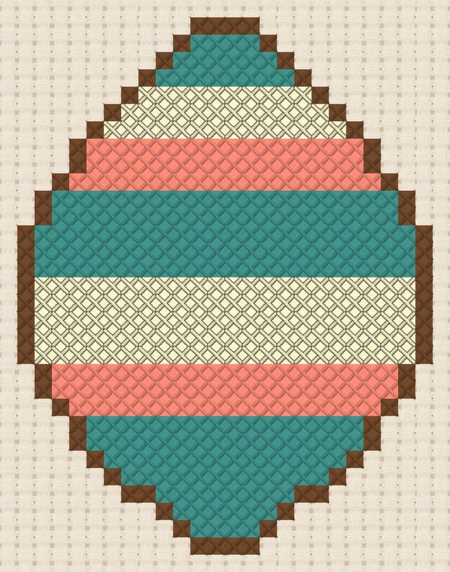 Easter egg finished in cross stitch on Aida cloth