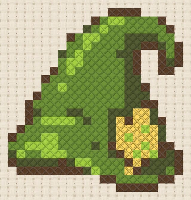 Elf hat finished in cross stitch on Aida cloth