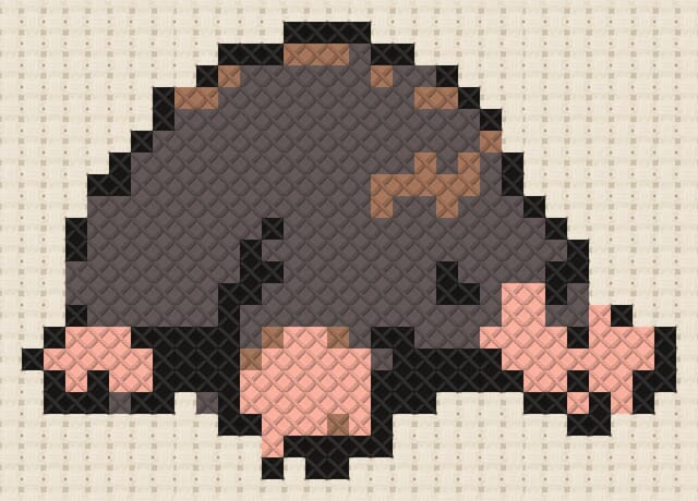 European mole finished in cross stitch on Aida cloth