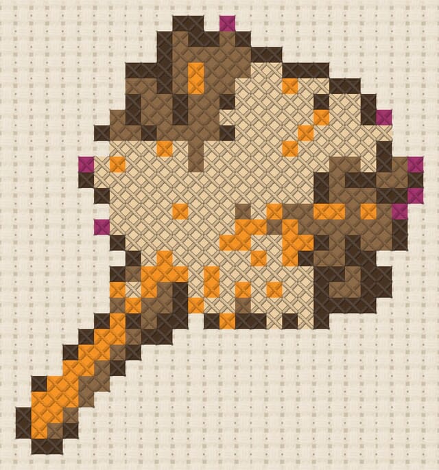 Feather duster finished in cross stitch on Aida cloth