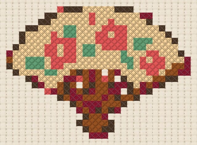 Festival fan finished in cross stitch on Aida cloth