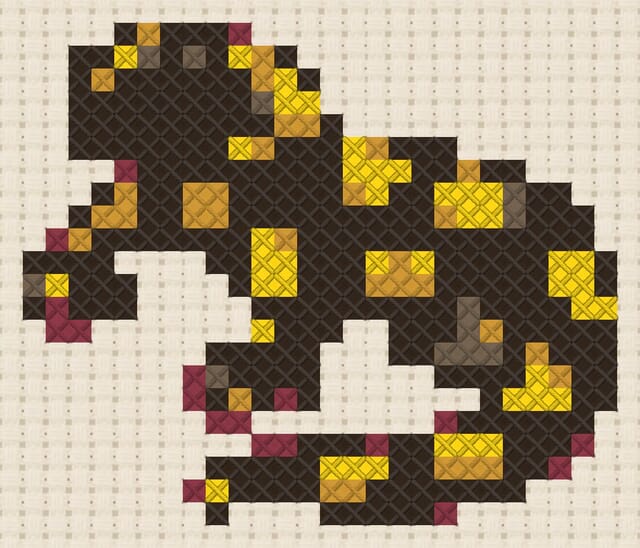 Fire salamander finished in cross stitch on Aida cloth