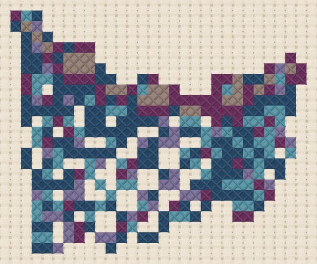 Fishing net finished in cross stitch on Aida cloth