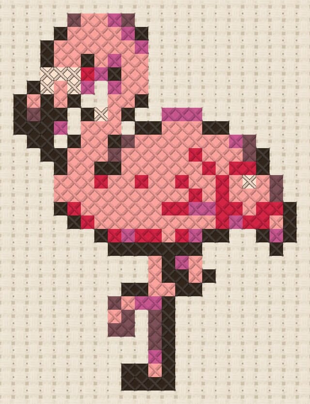 Flamingo dancer finished in cross stitch on Aida cloth