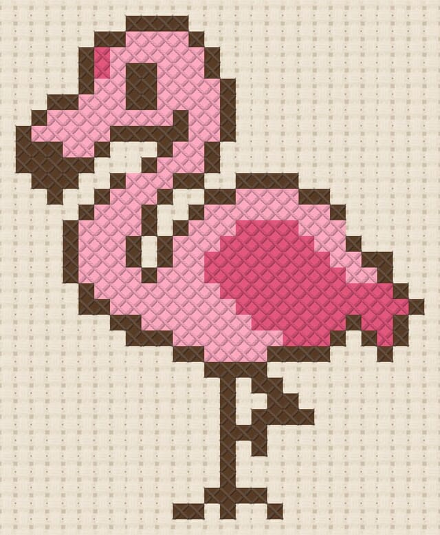 Flamingo finished in cross stitch on Aida cloth