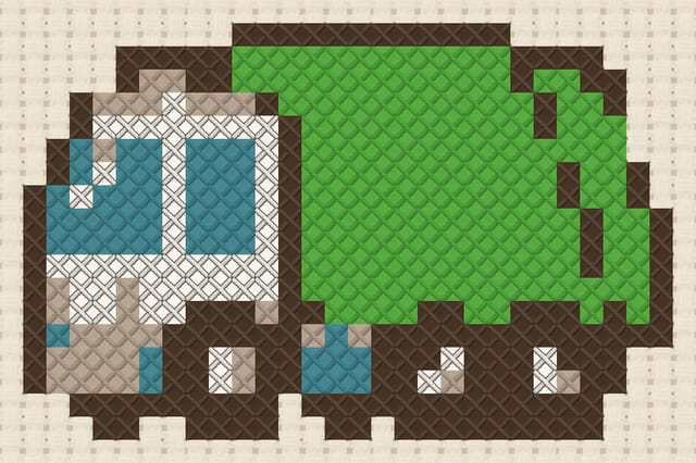 Garbage truck finished in cross stitch on Aida cloth