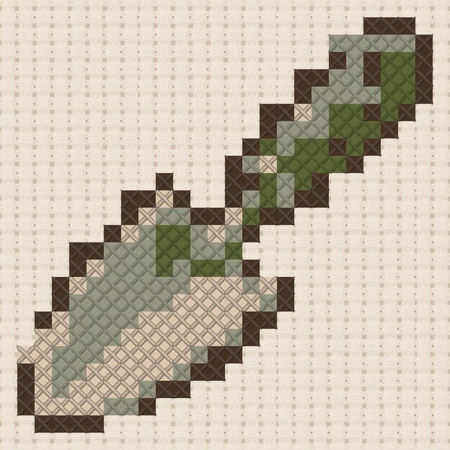 Garden trowel finished in cross stitch on Aida cloth