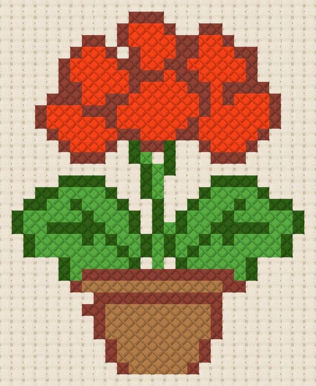 Geranium finished in cross stitch on Aida cloth