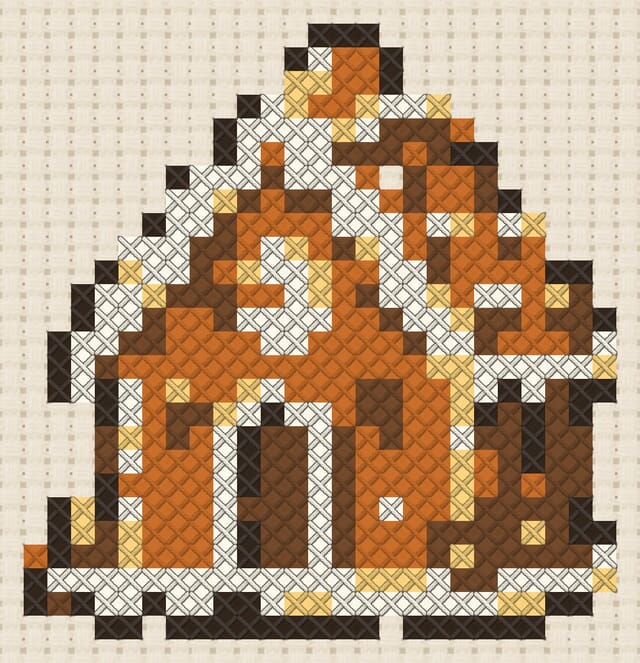 Gingerbread house finished in cross stitch on Aida cloth