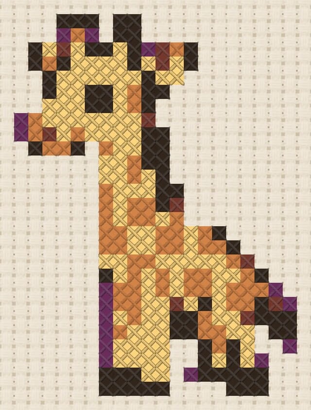 Giraffe finished in cross stitch on Aida cloth