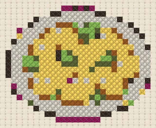 Gnocchi finished in cross stitch on Aida cloth