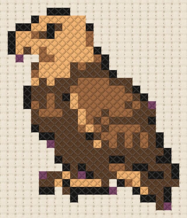 Golden eagle finished in cross stitch on Aida cloth