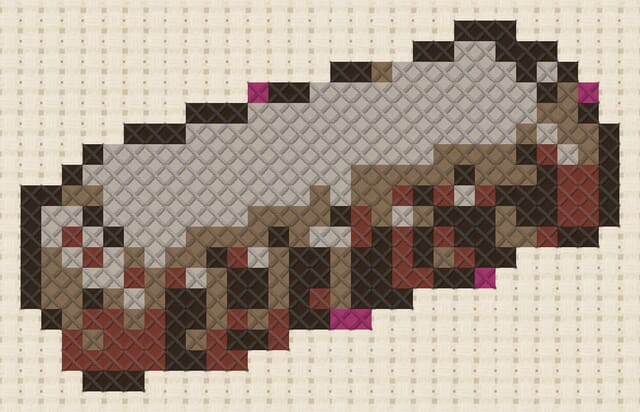 Harmonica finished in cross stitch on Aida cloth