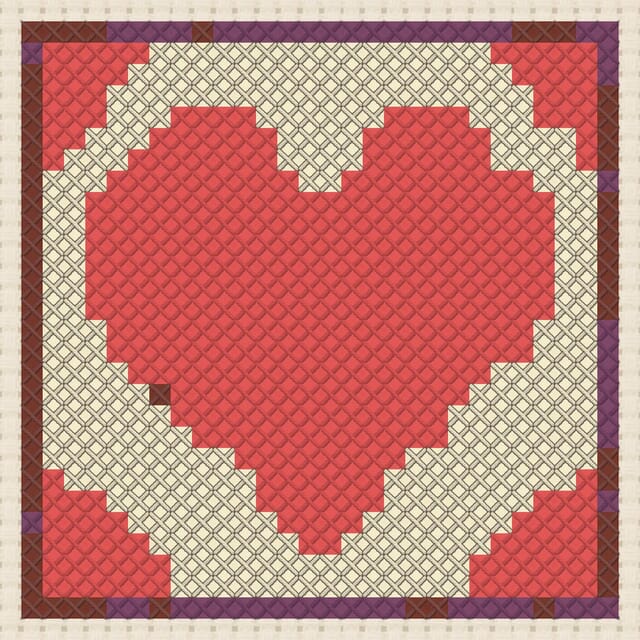 Heart quilt block finished in cross stitch on Aida cloth