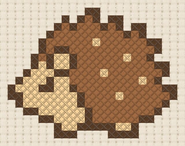 Hedgehog finished in cross stitch on Aida cloth