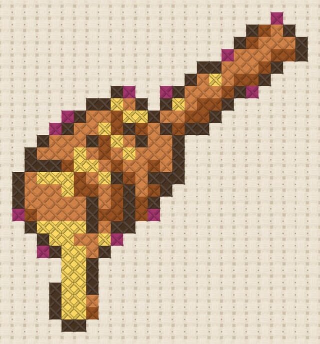 Honey dipper finished in cross stitch on Aida cloth