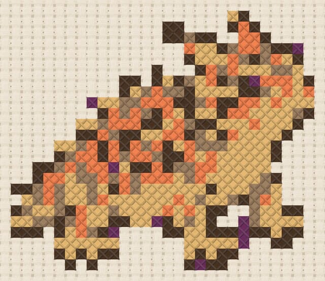 Horned lizard finished in cross stitch on Aida cloth