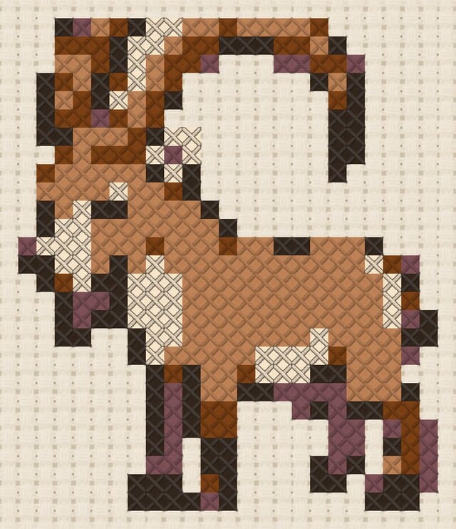 Ibex finished in cross stitch on Aida cloth
