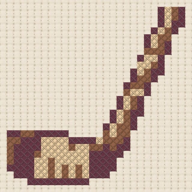 Ice hockey stick finished in cross stitch on Aida cloth