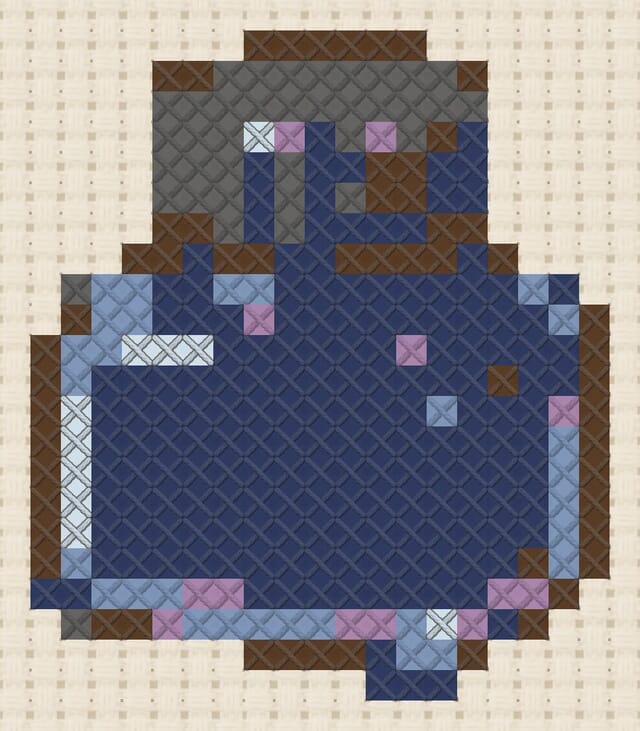 Ink bottle finished in cross stitch on Aida cloth