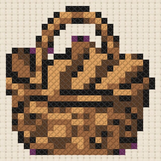 Kindling basket finished in cross stitch on Aida cloth
