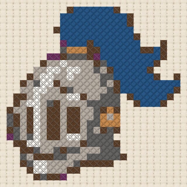 Knight helmet finished in cross stitch on Aida cloth