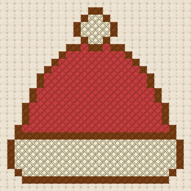 Knitted hat finished in cross stitch on Aida cloth