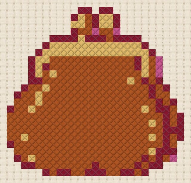 Leather coin purse finished in cross stitch on Aida cloth
