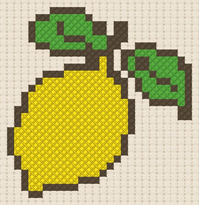 Lemon finished in cross stitch on Aida cloth