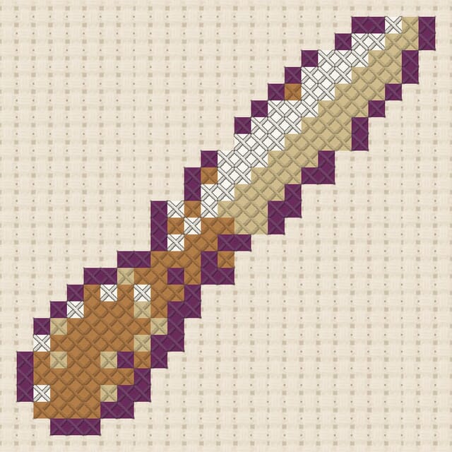 Letter opener finished in cross stitch on Aida cloth