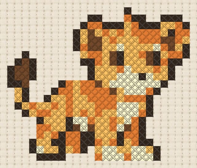 Lion cub finished in cross stitch on Aida cloth