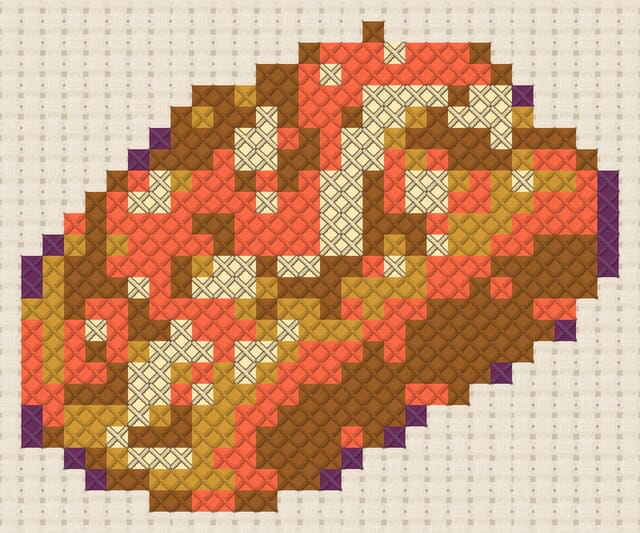 Lobster roll finished in cross stitch on Aida cloth
