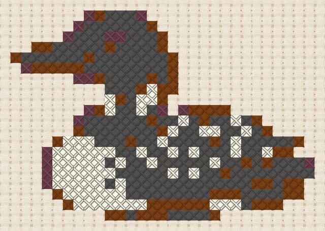 Loon finished in cross stitch on Aida cloth