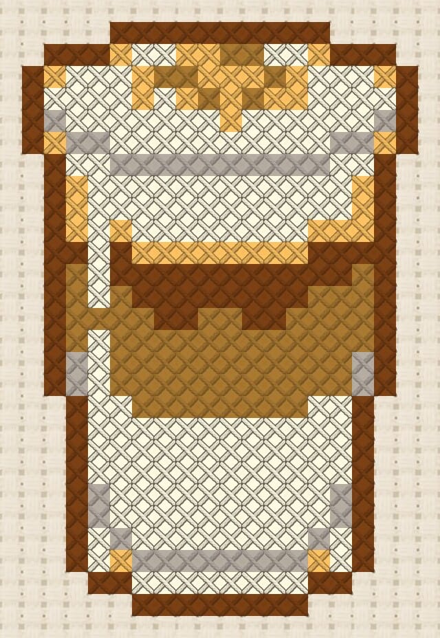 Macchiato in a glass finished in cross stitch on Aida cloth