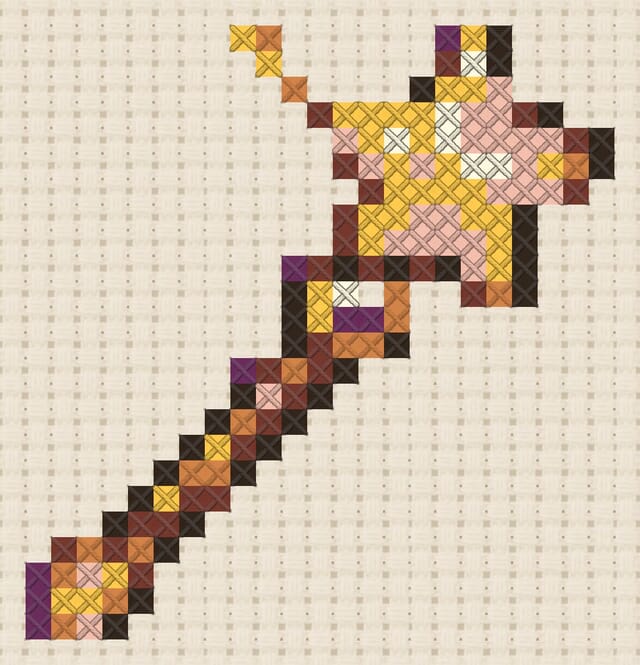 Magic wand finished in cross stitch on Aida cloth