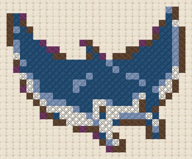 Manta ray finished in cross stitch on Aida cloth