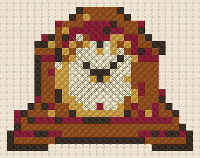 Mantel clock finished in cross stitch on Aida cloth