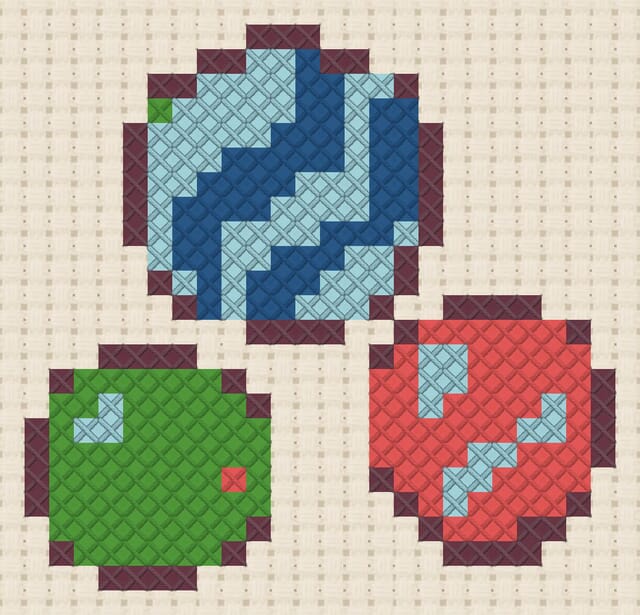 Marbles finished in cross stitch on Aida cloth