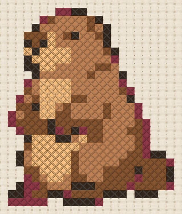 Marmot finished in cross stitch on Aida cloth