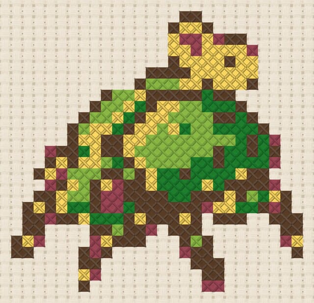 Mechanical beetle finished in cross stitch on Aida cloth