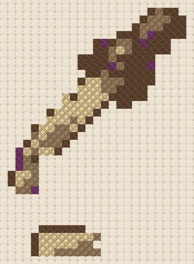 Medicine dropper finished in cross stitch on Aida cloth