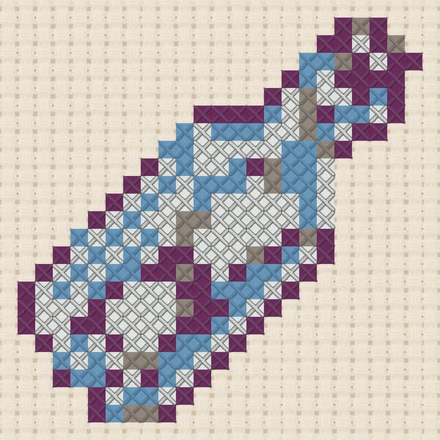 Message in a bottle finished in cross stitch on Aida cloth