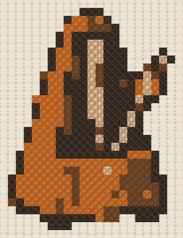 Metronome finished in cross stitch on Aida cloth