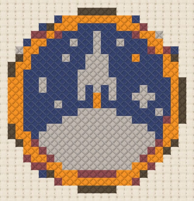 Mission patch finished in cross stitch on Aida cloth