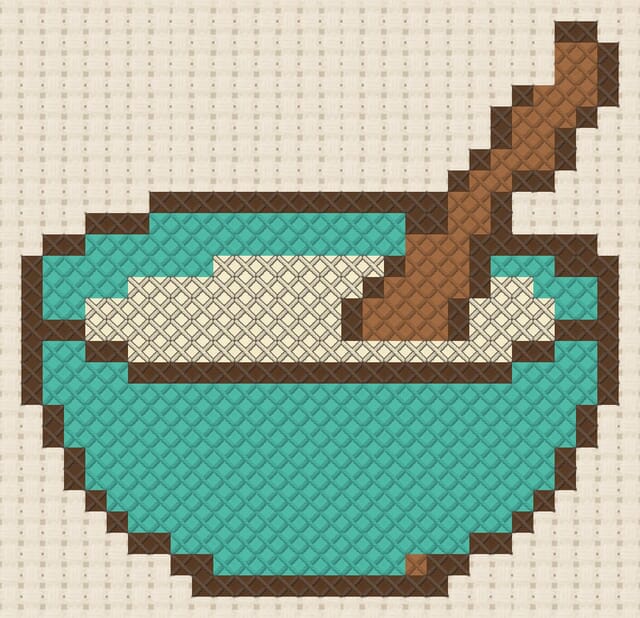 Mixing bowl finished in cross stitch on Aida cloth