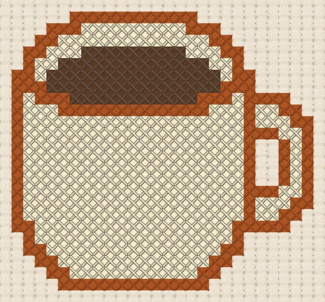 Mug finished in cross stitch on Aida cloth