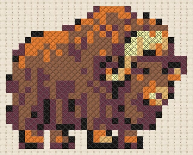 Musk ox finished in cross stitch on Aida cloth