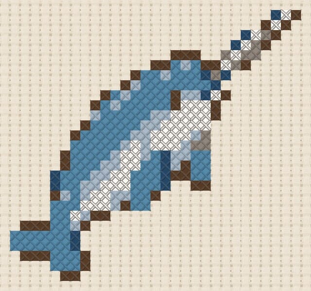 Narwhal finished in cross stitch on Aida cloth
