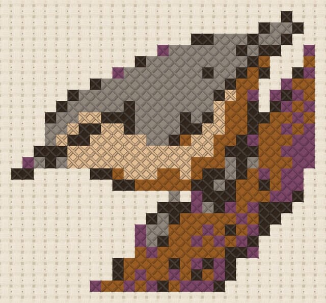 Nuthatch finished in cross stitch on Aida cloth