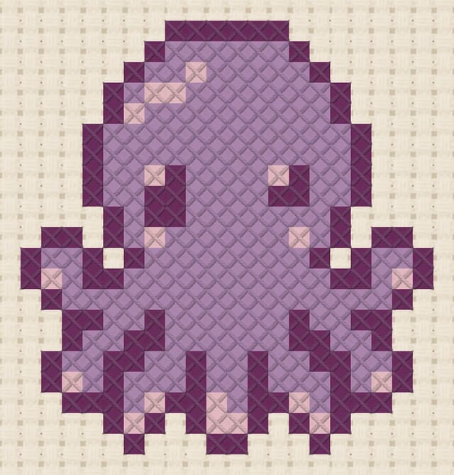 Octopus finished in cross stitch on Aida cloth